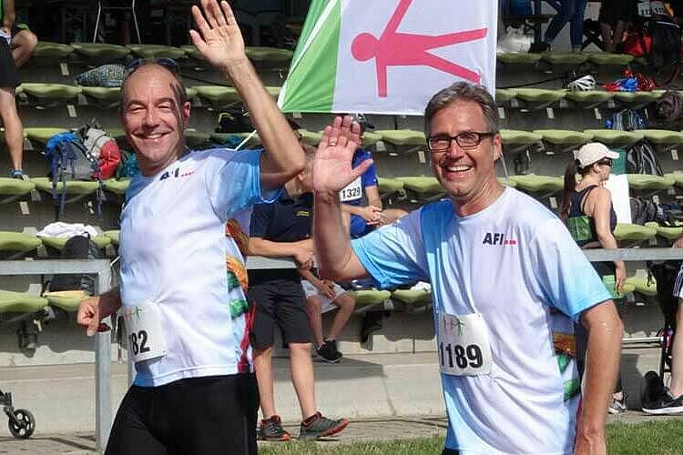 News AFI beim Hand in Hand Spendenlauf 2 Laeufer in AFI Shirts